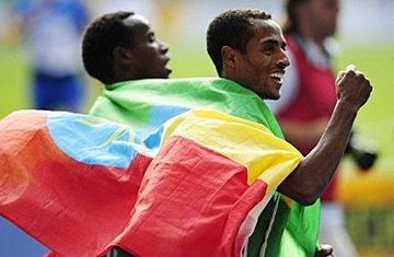 Kenenisa Bekele Wins World Distance Double (Video Interview)