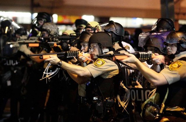 In the Wake of Ferguson, Obama Orders Review of U.S. Role in Arming Police