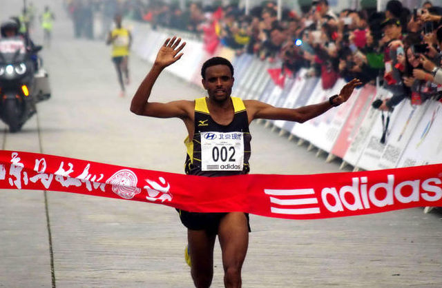 Ethiopia’s Girmay Birhanu Gebru Wins Beijing Marathon Amid ‘Hazardous’ Smog