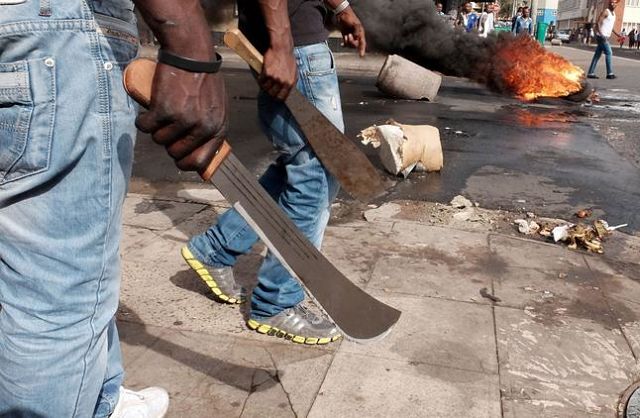 South Africa Mob Sets Two Ethiopian Brothers on Fire Inside Shipping Container